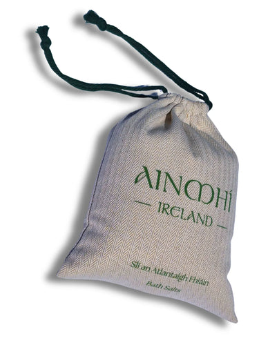 AINMHÍ Ireland Slián Atlantaigh Fhiáin Bath Salts in a beige herringbone drawstring pouch