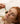 Woman using jade roller for natural skincare routine, gentle facial massage for sensitive skin