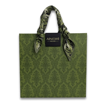 Elegant green damask tote bag with silk scarf handles and AINMHÍ Ireland brand tag